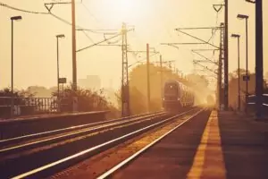 Passenger train at sunrise.